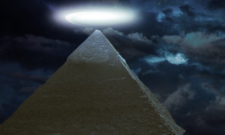 Strange light above pyramid. Shutterstock.