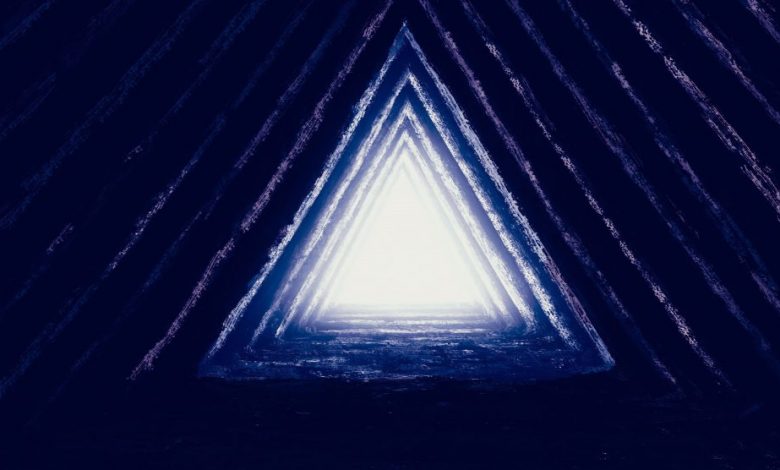 An artists rendering of light inside a pyramid. Shutterstock.