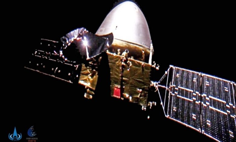 An image of the Tianwen 1 mission taken by the TW-1 Deployable Camera (T.D.C.). Image Credit: China National Space Administration.
