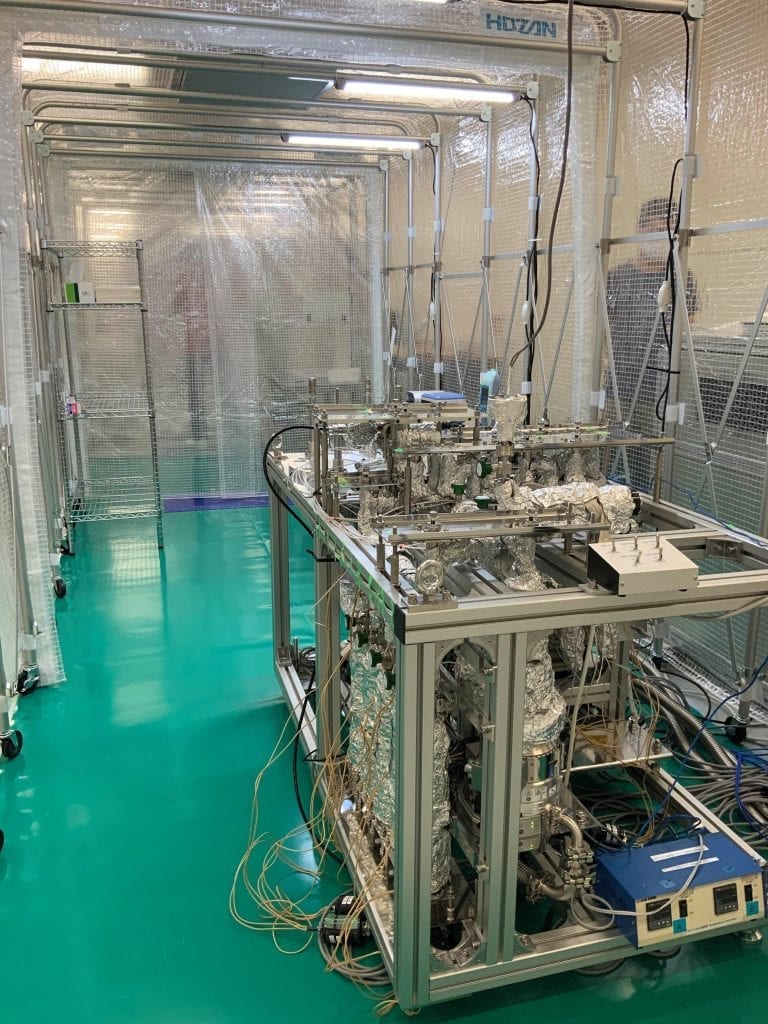The Woomera Local Headquarters in Australia and the gas analysis equipment brought there to do the earliest research when the capsule was opened. Credit: JAXA