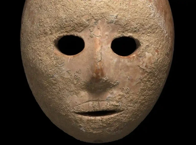 Ancient Stone Mask. Credit: Clara Amit, Israel Antiquities Authority.