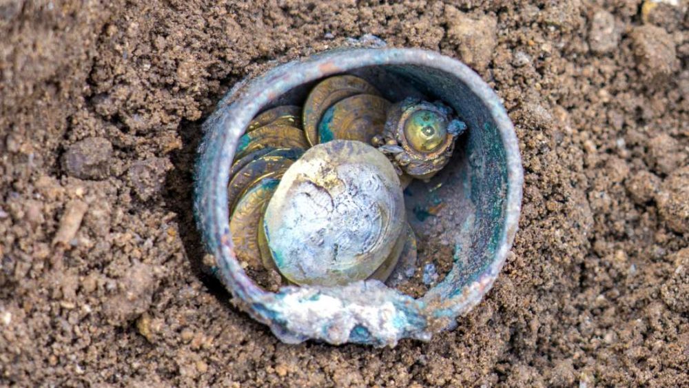 The 900-year-old coins were discovered in the ancient city of Caesarea. Image Credit: Yaniv Berman.