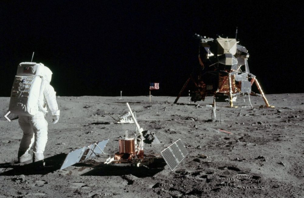 Aldrin next to the Passive Seismic Experiment Package with Eagle in the background. Image Credit: Wikimedia commons.