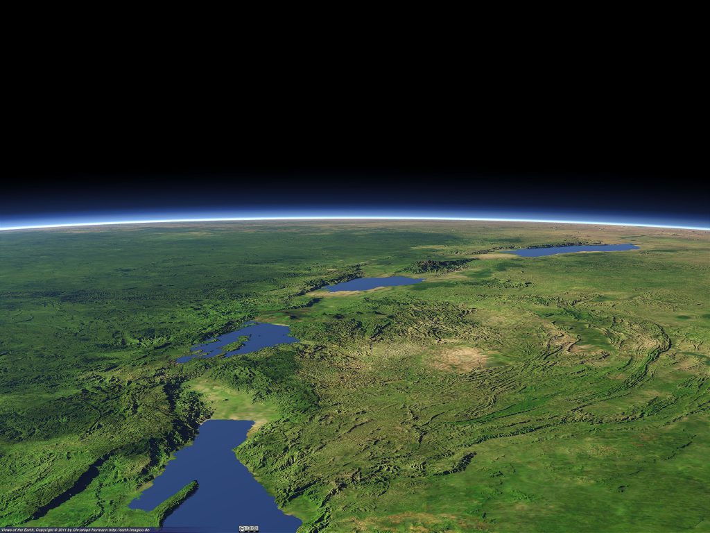 An artificial rendering of the Albertine Rift, which forms the western branch of the East African Rift. Visible features include (from background to foreground): Lake Albert, the Rwenzori Mountains, Lake Edward, the volcanic Virunga Mountains, Lake Kivu, and the northern part of Lake Tanganyika. Image Credit: Wikimedia Commons.