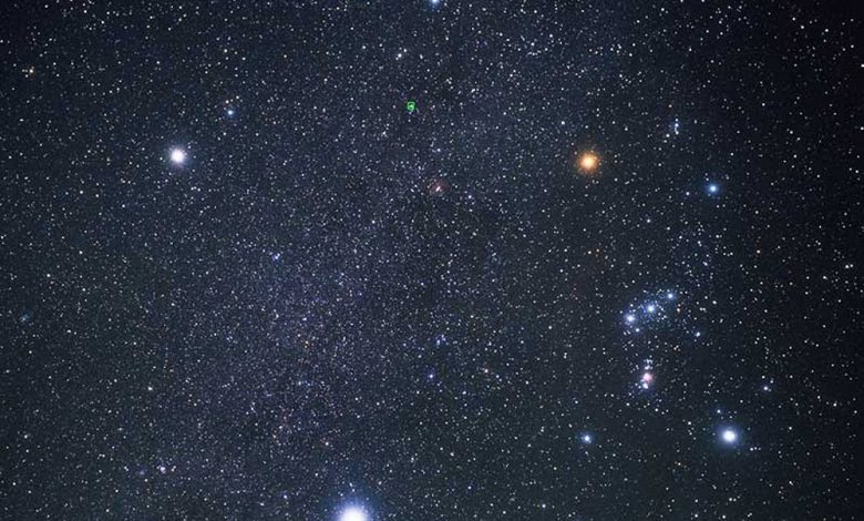Procyon (top left), Betelgeuse (top right), and Sirius (bottom) form the Winter Triangle. Orion is to the right. Image Credit: Hubble European Space Agency / Akira Fujii.