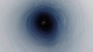 A view down the the borehole at about 3,500 feet (1,070 meters) below the ice. Image Credit: Kathy Kasic/salsa-antarctica.org.