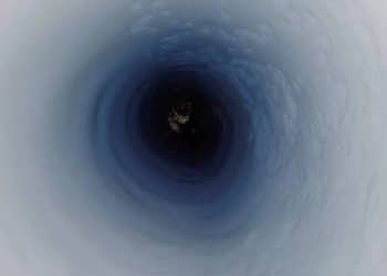 A view down the the borehole at about 3,500 feet (1,070 meters) below the ice. Image Credit: Kathy Kasic/salsa-antarctica.org.