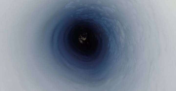 A view down the the borehole at about 3,500 feet (1,070 meters) below the ice. Image Credit: Kathy Kasic/salsa-antarctica.org.