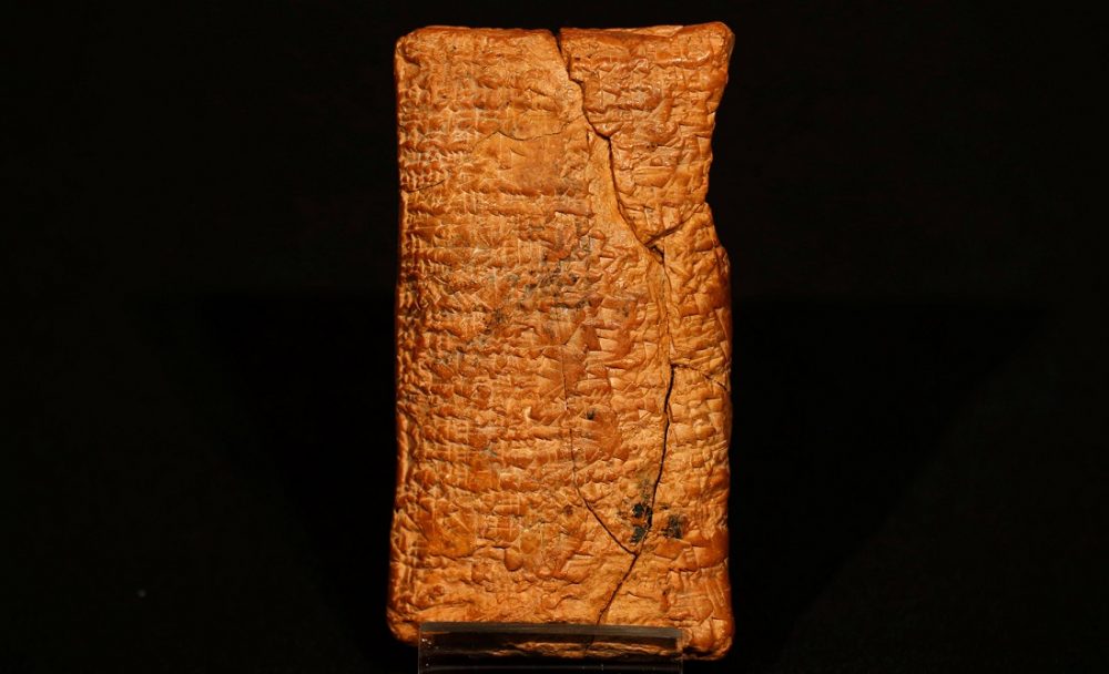 The clay tablet telling the story of the flood and the shape of the ark. Image Credit: AP Photo/Sang Tan.