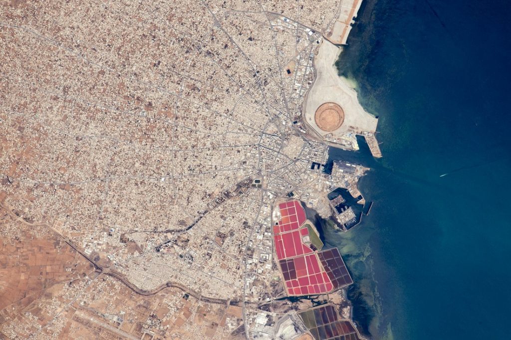 Another amazing photograph taken by astronauts on board the ISS. This image shows radiating street pattern of Tunisia's second city, Sfax. Image Credit: NASA.