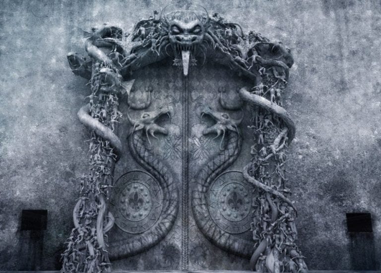 Stone cobra carvings guarding the sealed door of the Padmanabhaswamy Temple in India. Vault B door with Cobra guardians.