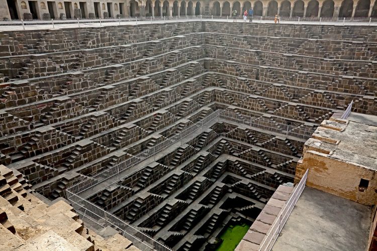 The Ancient Stepwell of Chand Baori—with 3,500 narrow steps over 13 levels high. Image Credit: Pinterest.