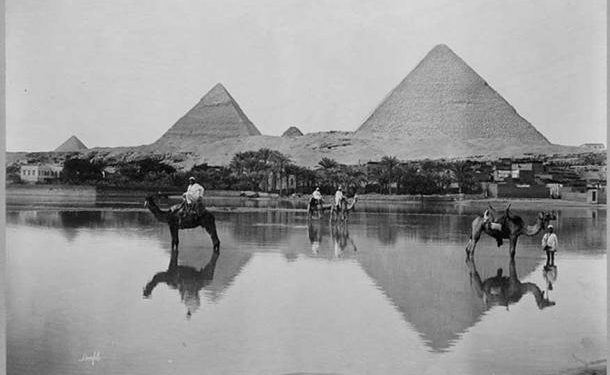 A Village and the pyramids during the flood-time, circa 1890 (Public Domain).