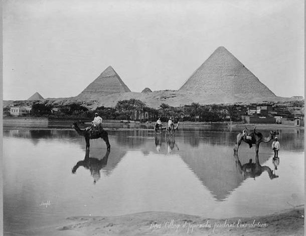 A Village and the pyramids during the flood-time, circa 1890 (Public Domain).