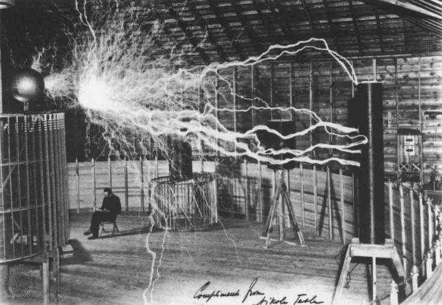 A photograph of Nikola Tesla in his Colorado Springs Laboratory. The image was captured in 1899.