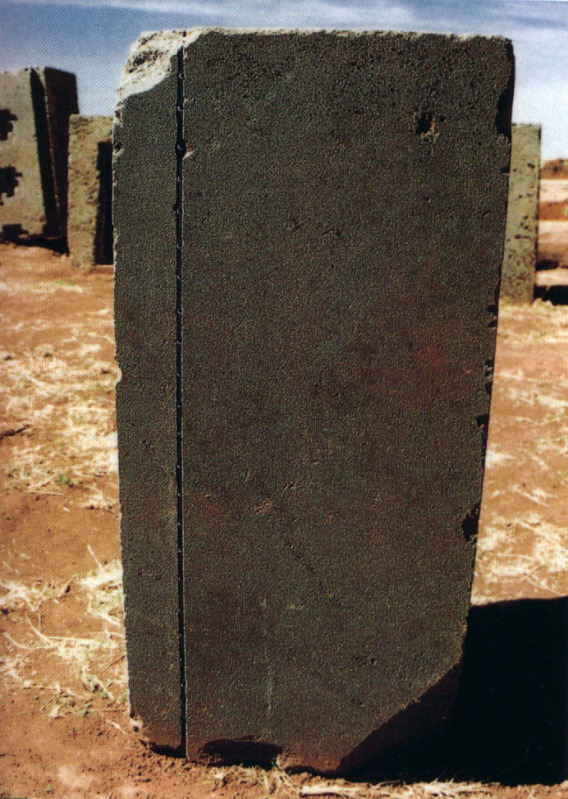 Detail of stone with precisely cut straight line and tooled holes within the line at Puma Punku. Image Credit: Wikimedia Commons.