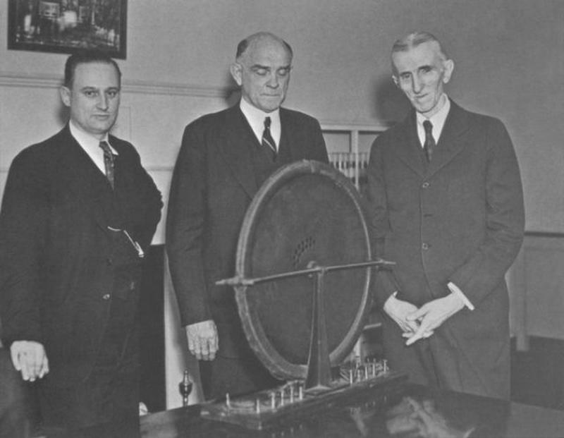 A photograph of John T. Morris, Victor Beam and Nikola Tesla.