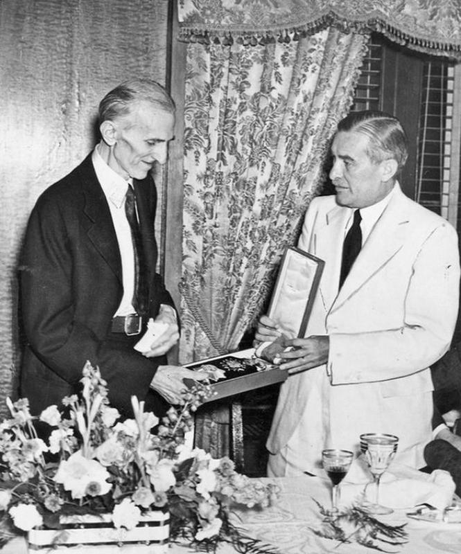 A photograph of Nikola Tesla in 1937, accepting the order of the White Lion.
