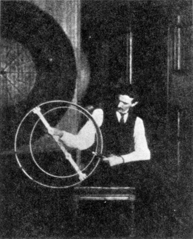 Nikola Tesla performing one of his many experiments in his laboratory.
