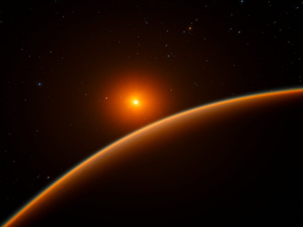 This artist’s impression shows the exoplanet LHS 1140b, which orbits a red dwarf star 40 light-years from Earth and may be the new holder of the title “best place to look for signs of life beyond the Solar System”. Image Credit: Wikimedia Commons.