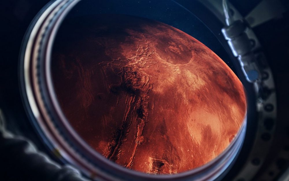 An artists illustration of a spacecraft visiting Mars. Shutterstock.