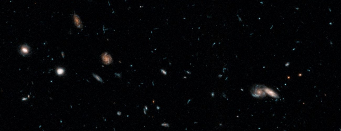 The image mosaic presents a wide portrait of the distant universe and contains roughly 265,000 galaxies. They stretch back through 13.3 billion years of time to just 500 million years after the universe's birth in the big bang. Image Credit:  NASA, ESA, and G. Illingworth (University of California, Santa Cruz; UCO/Lick Observatory).
