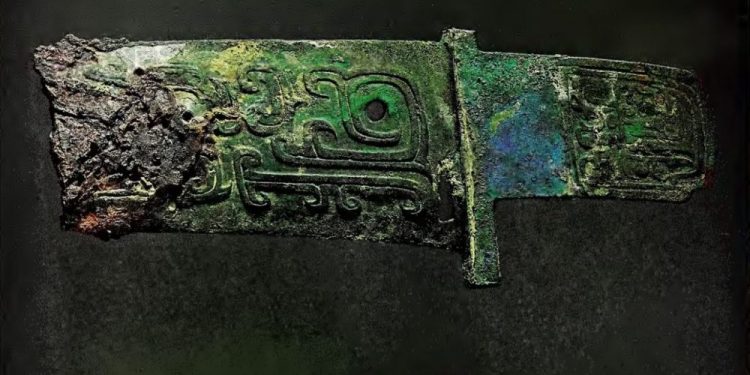 Ancient Chinese Axe crafted from Meteorite Iron. This image was extracted from the paper: 'Two Early Chines Bronze Age Weapons With Meteoritic Iron Blades. 1971.