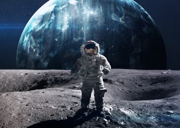 An artistic rendering of an astronaut standing on the Moon. Depositphotos.