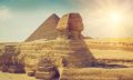 An image of the Sphinx with the pyramid in the background.