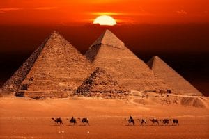 The Pyramids at Giza and the sunset. Shutterstock.