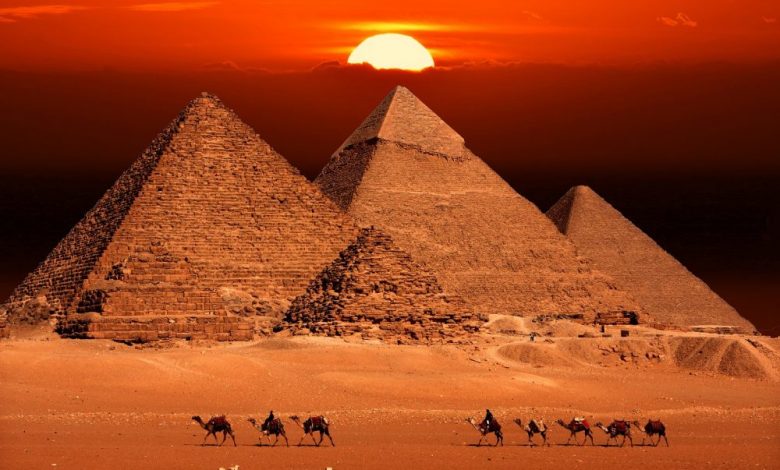 The Pyramids at Giza and the sunset. Shutterstock.