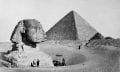 The Great Sphinx with the Pyramid of Pharaoh Cheops in the background. 1877 photo by French photographer Henri Bechard. Shutterstock.