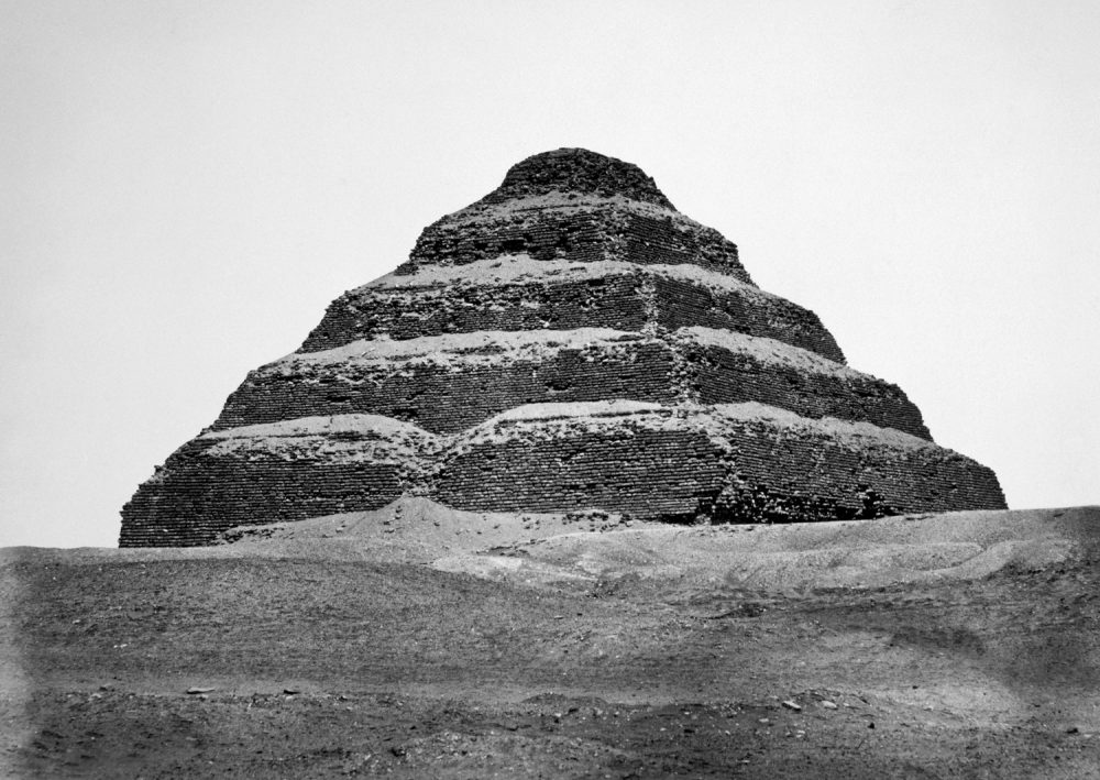 The Step Pyramid of King Zoser, III Dynasty, Old Kingdom, ca. 2590 B.C., photograph by Antoine Beato ca. 1880. Shutterstock.