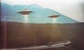 Two UFOs flying in the sky. Shutterstock.