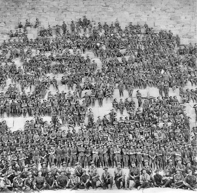 Group photo of Australian 11th Battalion soldiers on the Great Pyramid in 1915. Wikimedia Commons.