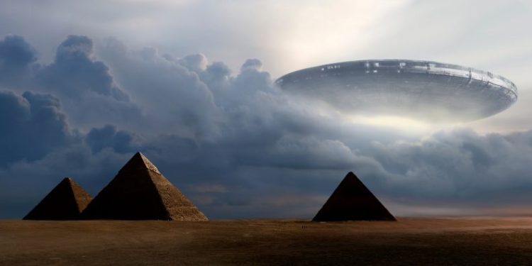 Artists rendering of a UFO over the Pyramids at Giza. Shutterstock.