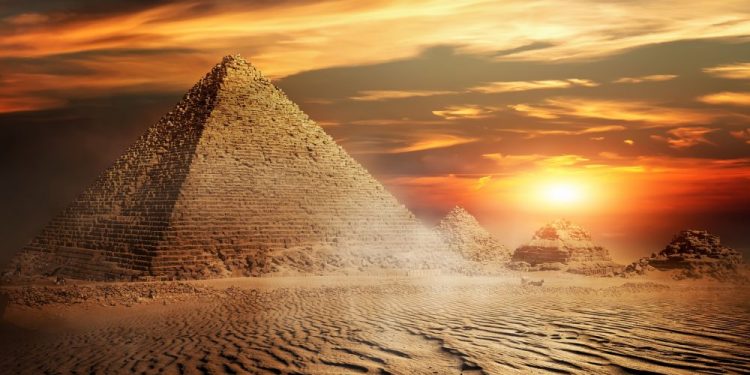 An Egyptian Pyramid and sunset. Shutterstock.