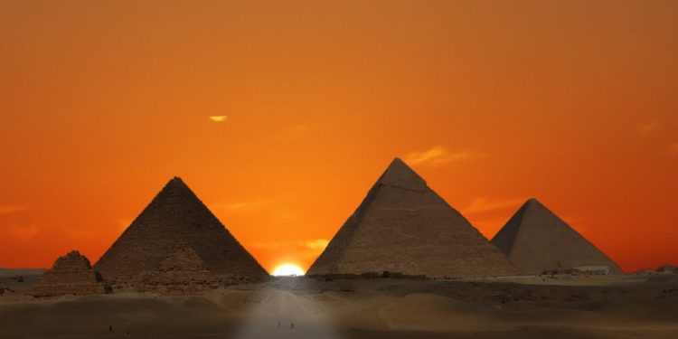 The Pyramids at Giza at sunset. Shutterstock.