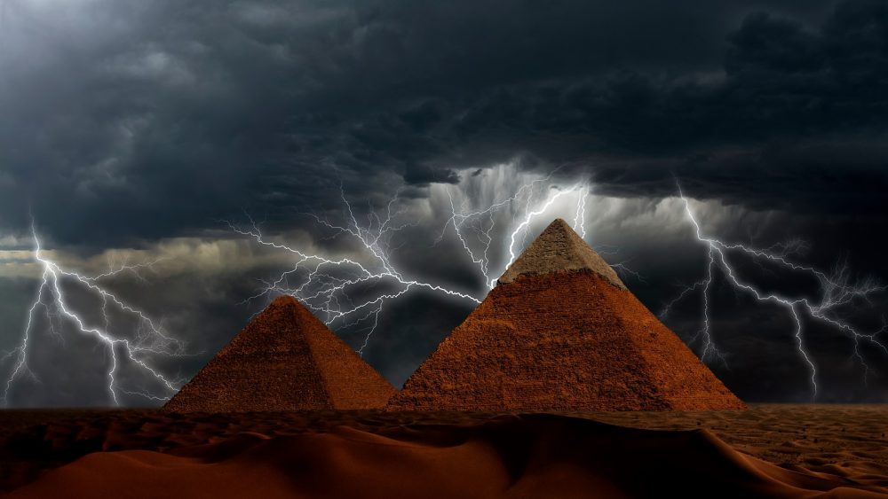 Pyramids at Giza and lightning. Shutterstock.