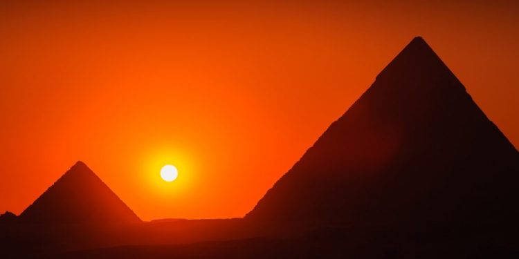 Pyramids and the sunset. Shutterstock.