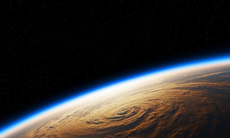 Artists rendering of a planet with thick cloud systems. Shutterstock.