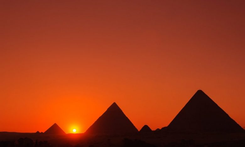 The Pyramids at Giza at sunset. Shutterstock.
