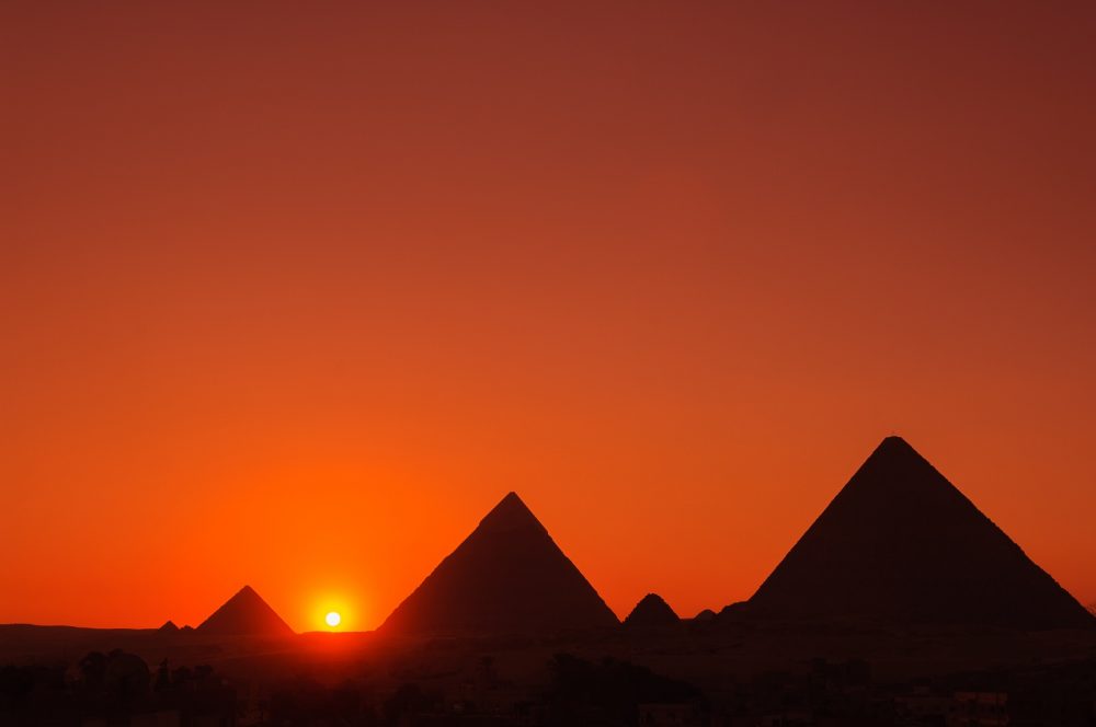 The Pyramids at Giza at sunset. Shutterstock.