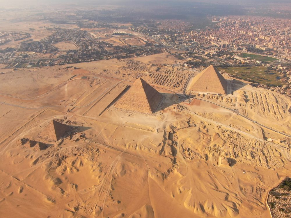 A stunning aerial view of the three main pyramids at the Giza plateau. Shutterstock.