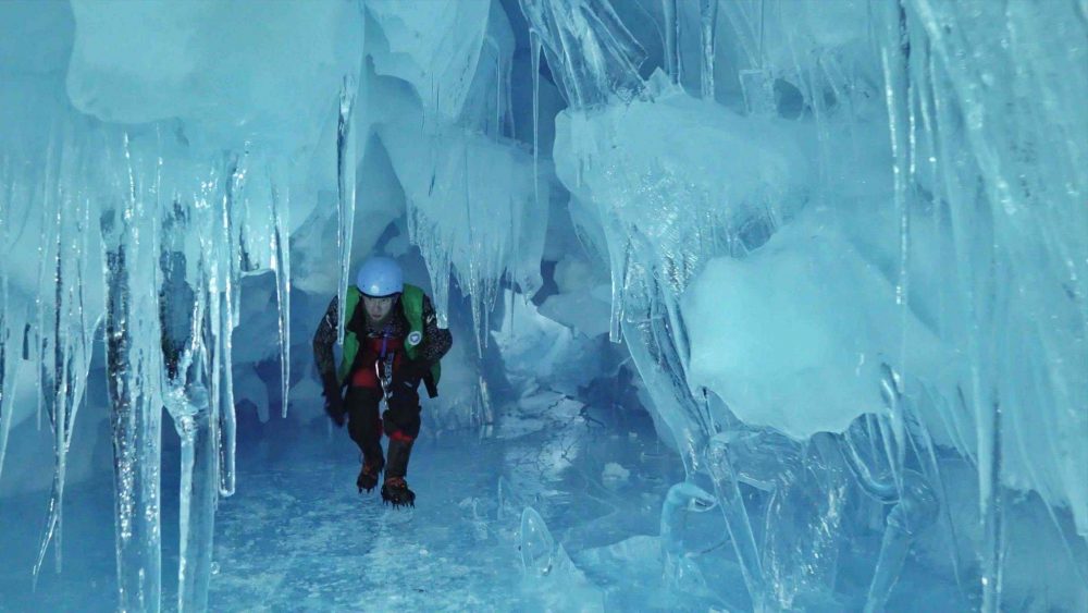 An Ukrainian explorer walking through the cave. Image Credit: Image Credit: Press Service of the Ministry of Education and Science of Ukraine.