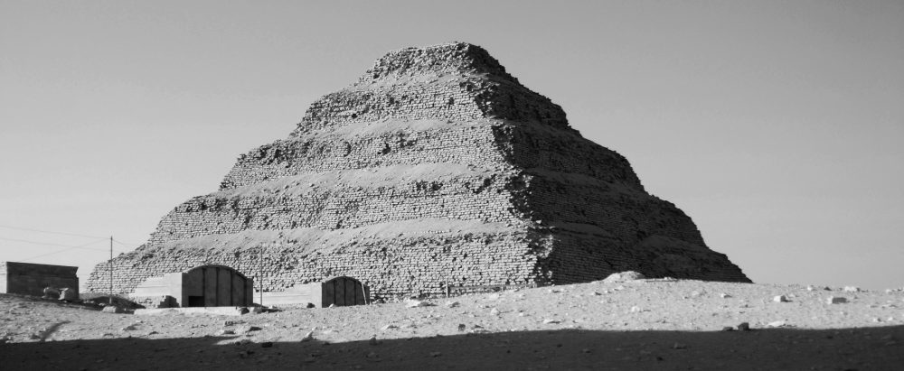 A black and white image of the Step Pyramid of Djoser at Saqqara. Shutterstock.