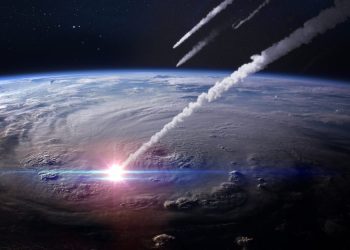 An illustration showing asteroids impacting Earth. Shutterstock.