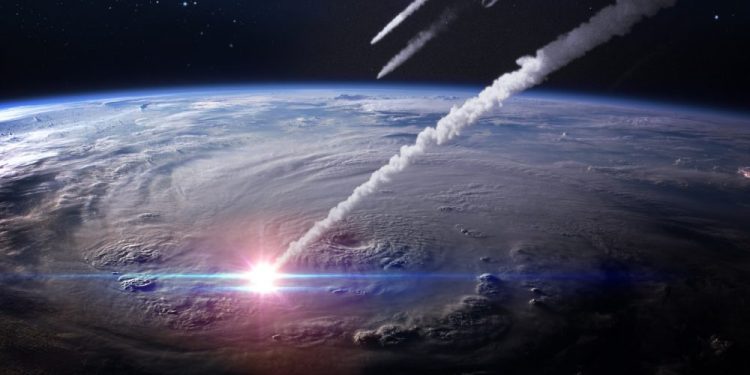 An illustration showing asteroids impacting Earth. Shutterstock.