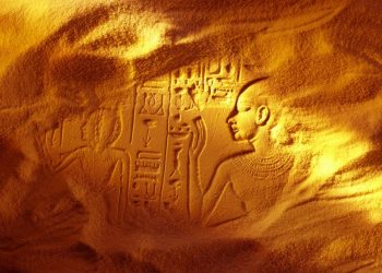 An image of an ancient Egyptian structure buried beneath the sand. Shutterstock.