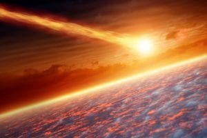 An artists rendering showing an asteroid entering Earth's atmosphere. Shutterstock.